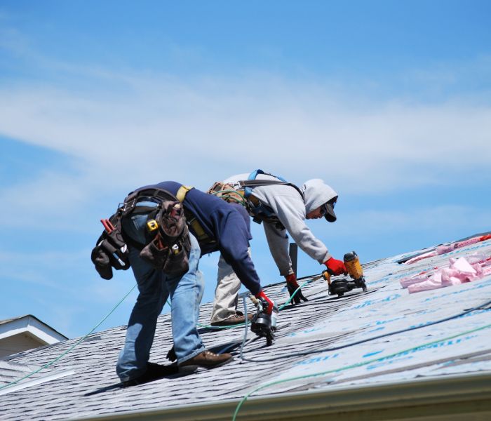 Roofers repairing a roof in Allentown, PA